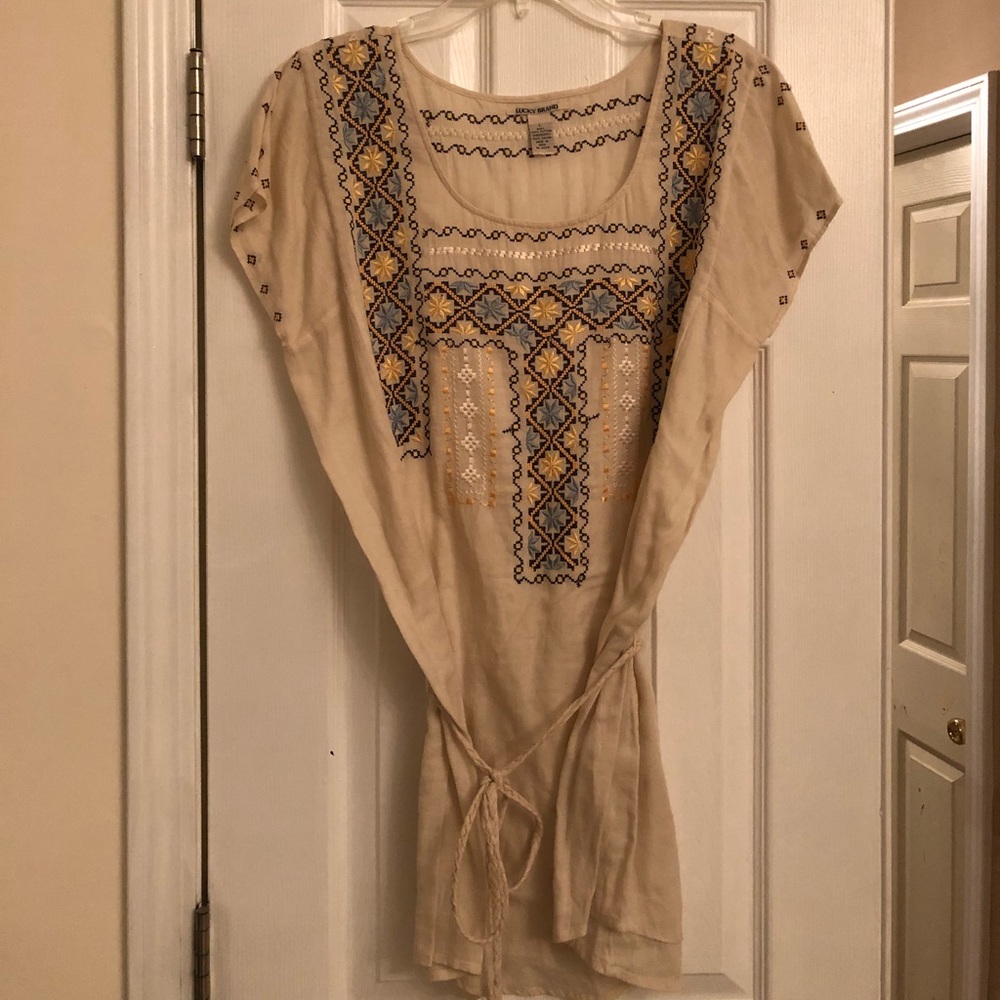 Cream tunic with blue and gold stitch detailing
